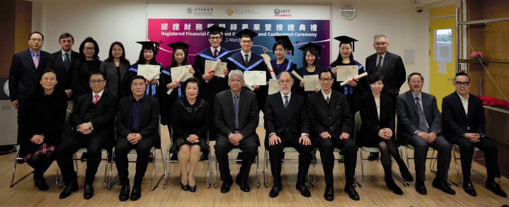 A group photo of graduates and attended guests