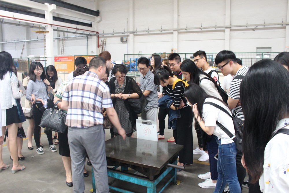 Mr. Feng Shizhong, General Manager of Ahlstrom Machinery Co., Ltd introducing the workshop
