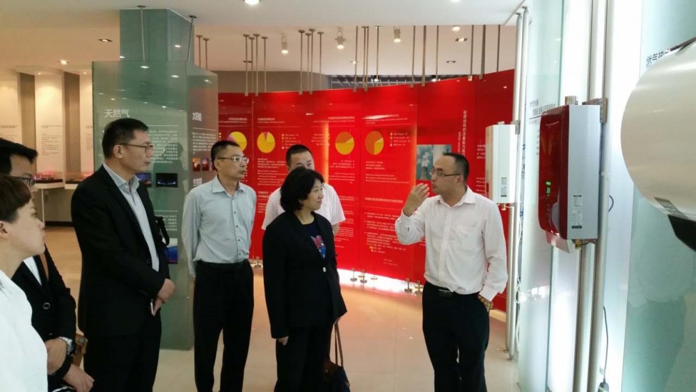 The delegation listening to product updates in the China Macro Pavilion