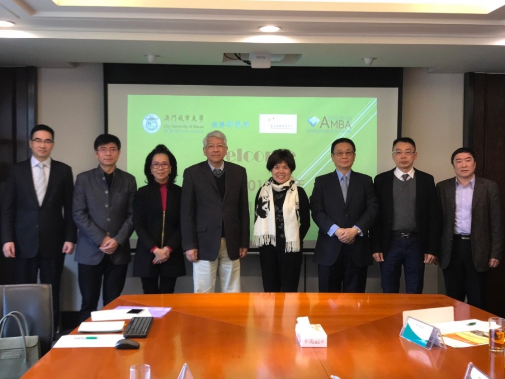 A group photo of Rector Shu Guang Zhang, Registrar Sean Li, Dr. Eva Khong, Executive Associate Dean of FOB and Faculty of Business Advisory Board