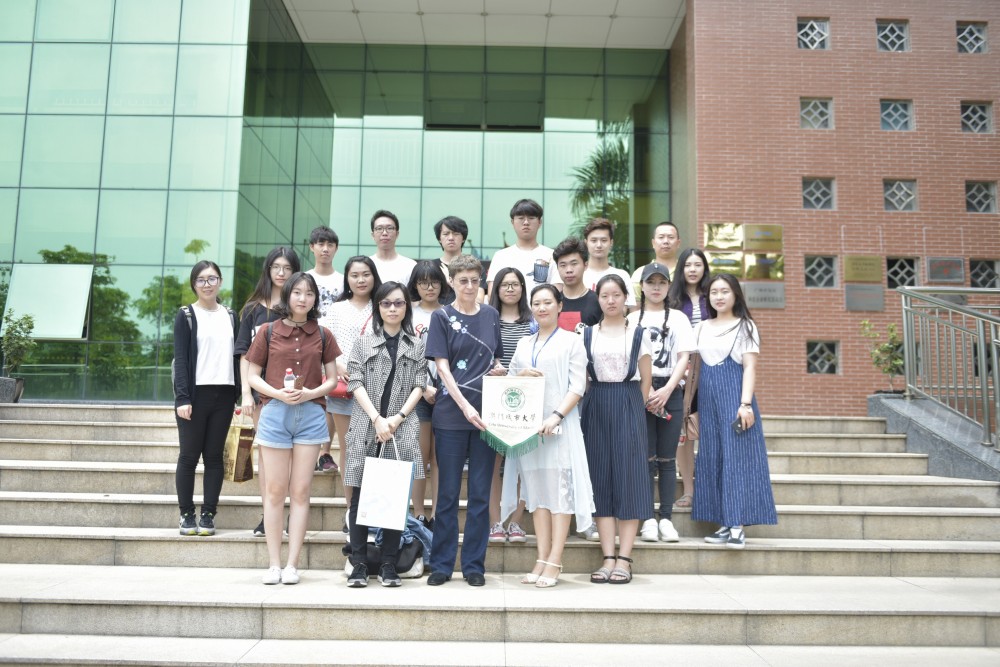 Group photo of the International Business Cohort and Ms. Carol Lee, Associate Director of Gosun