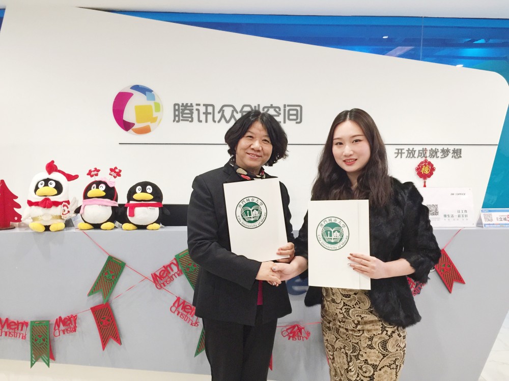 Vice Rector Kong signed agreement with Ms. Chen Xuan at Guangzhou Shengyuan Information Technology Limited