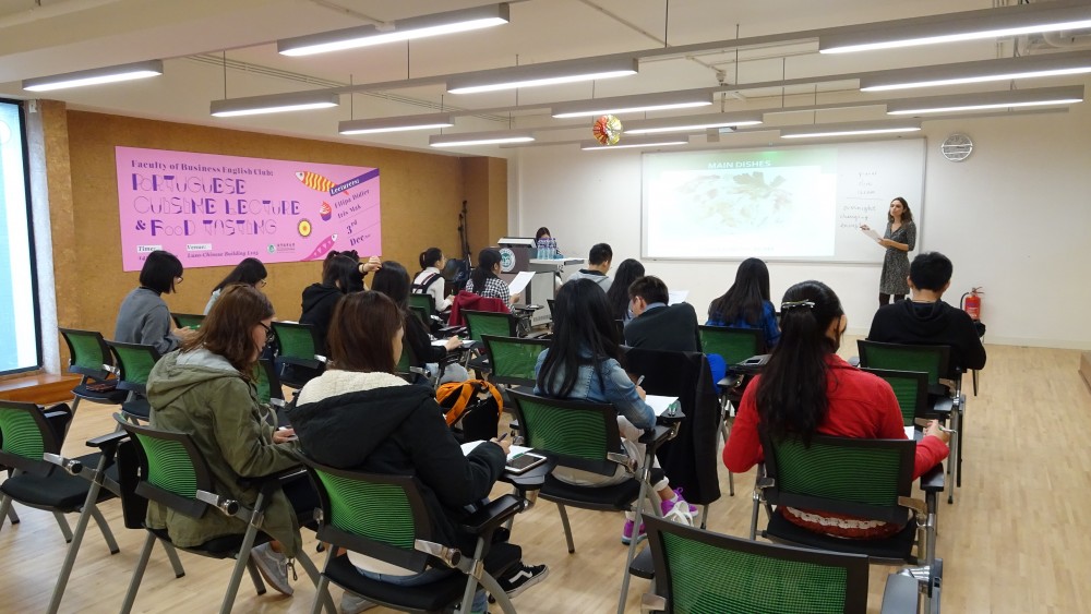 Students obtaining knowledge of Portuguese cuisine culture