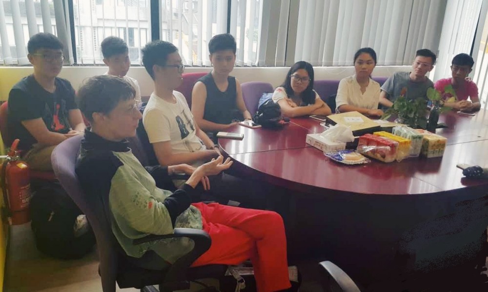 Professor Roberts communicating with students