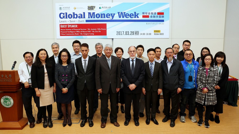 A group photo of Rector Shu Guang Zhang, guests, FOB Dr. Eva Khong and FOB teachers