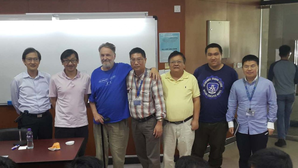 Group photo of Professor John Horton Conway and UM professors and students